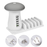 White and gray charging station with multiple USB ports and plug types displayed.